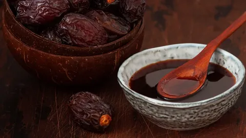 شیره خرما طبیعی اصل با عطر و رنگ طبیعی